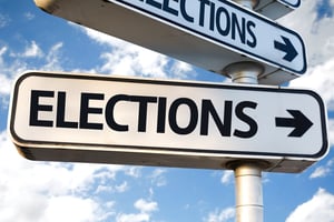 Elections direction sign on sky background